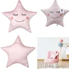 Coussin forme étoile sourire dormeur rose 44x37cm