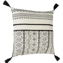 Coussin noir et blanc à pompons design ethnique