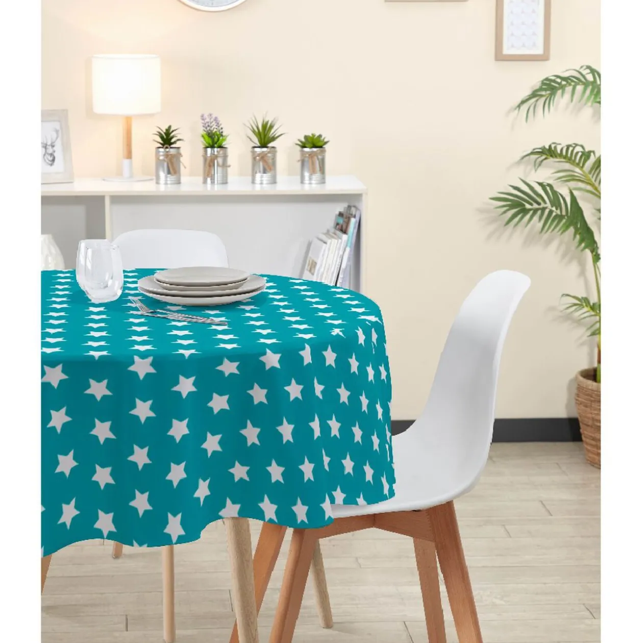 Nappe ronde bleue avec imprimé étoiles blanches