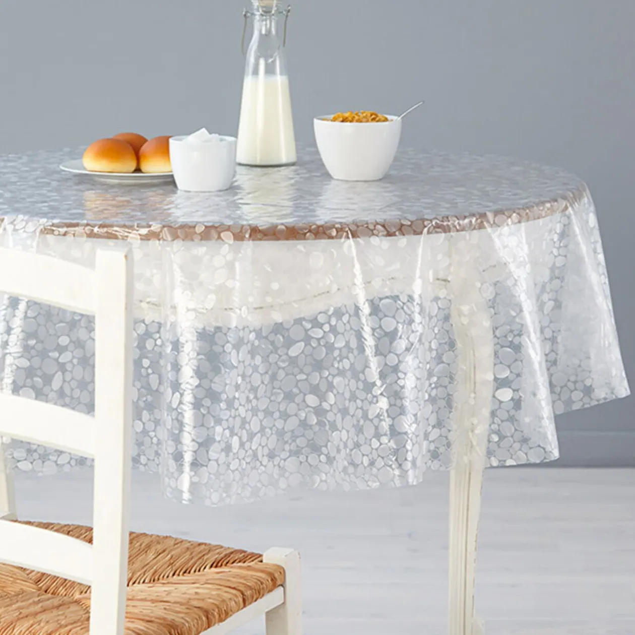 Nappe ronde transparente design galets 3D blancs