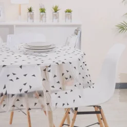 Nappe ronde transparente motifs triangles noirs