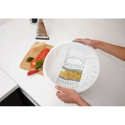 Passoire avec ouverture trappe