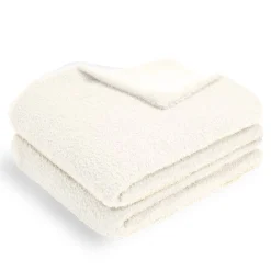 Plaid bouclette 130x160cm polyester 3 coloris