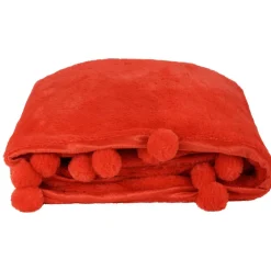 Plaid effet fourrure avec des pompons