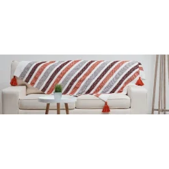 Plaid rayé à pompons