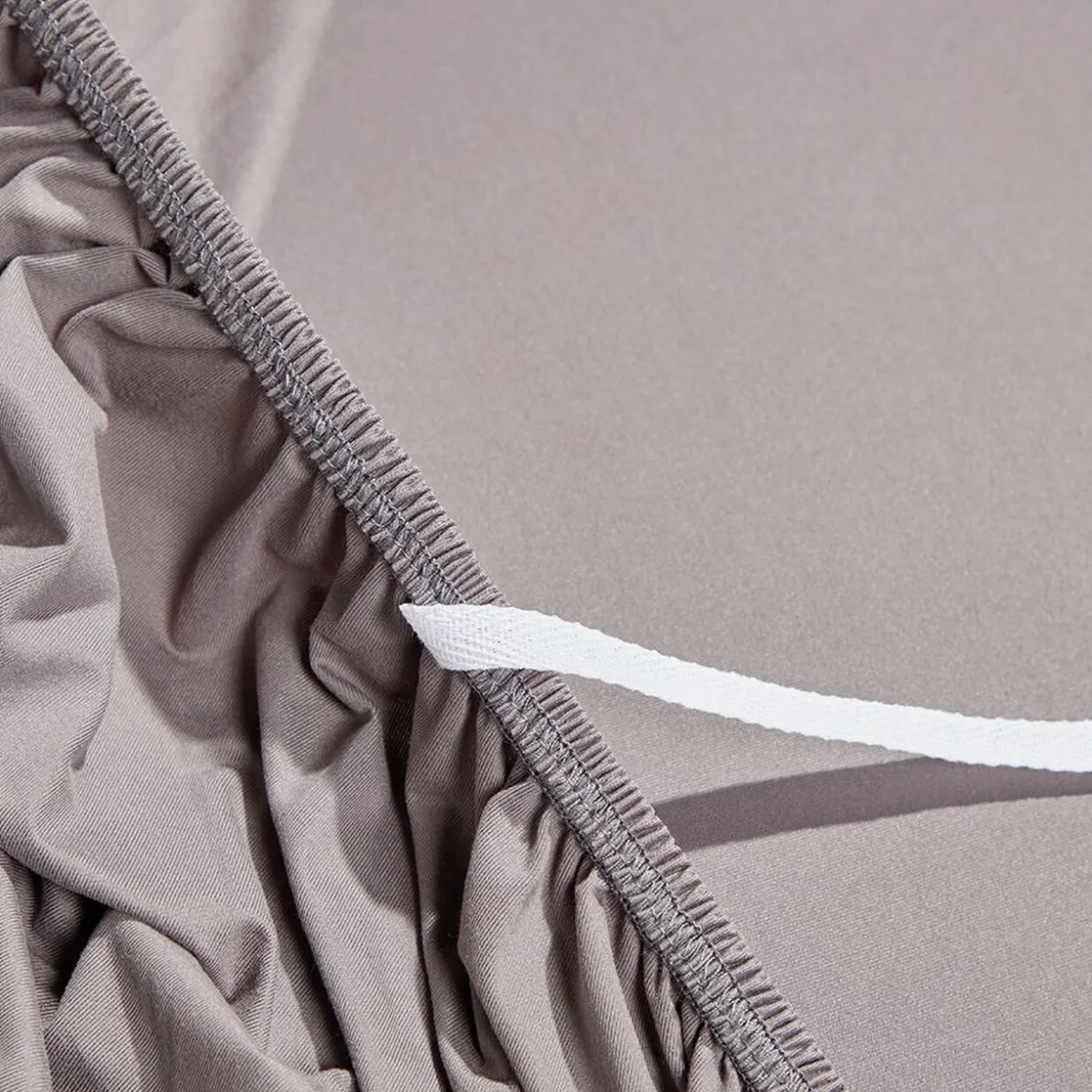 Protège canapé extensible 3 places uni gris 195 à 230 cm