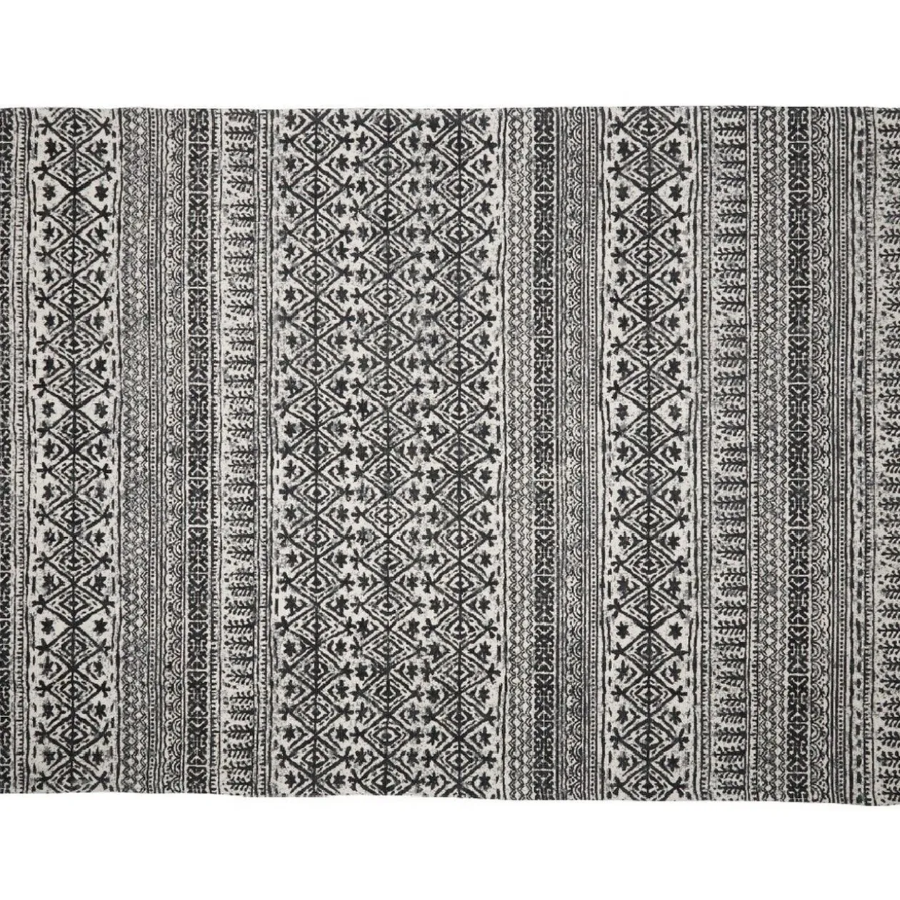 Tapis imprimé design géométrique blanc et noir