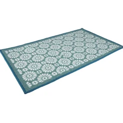 Tapis rétro vert à fleurs blanches bord bleu