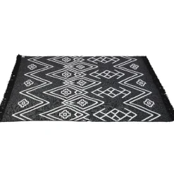 Tapis réversible motifs ethniques bicolore noir et blanc