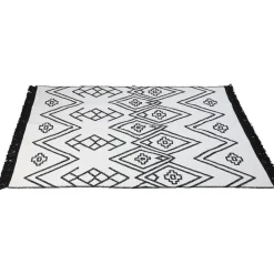 Tapis réversible motifs ethniques bicolore noir et blanc